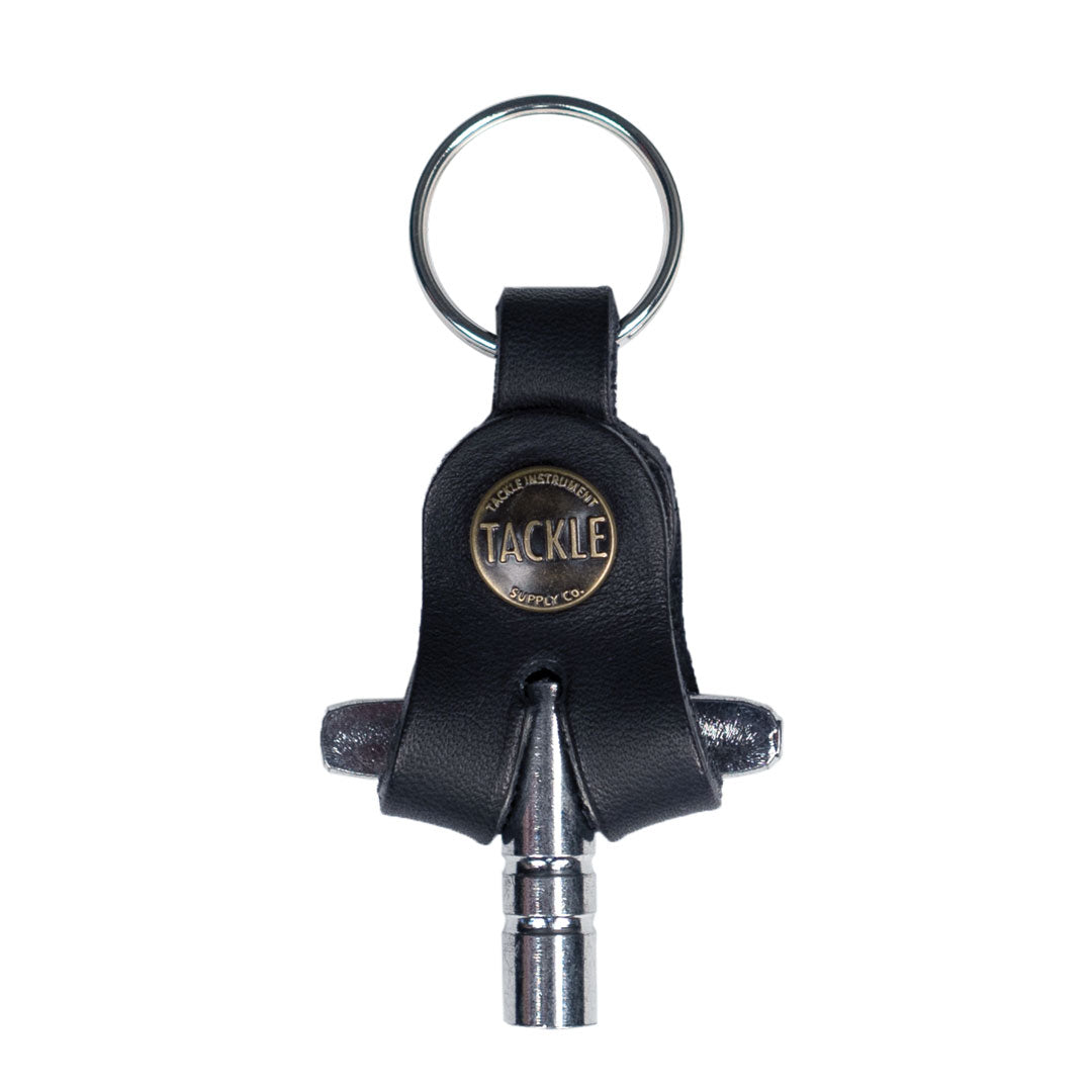 A Black Tackle Leather-Bound Drum Key